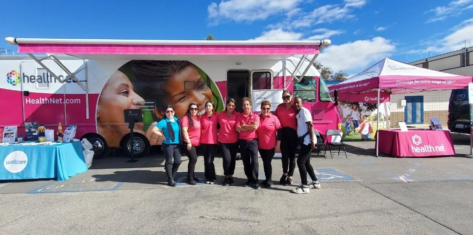 Health Net employees with RV at Healthful Harvest, a community wellness event in Arvin, California